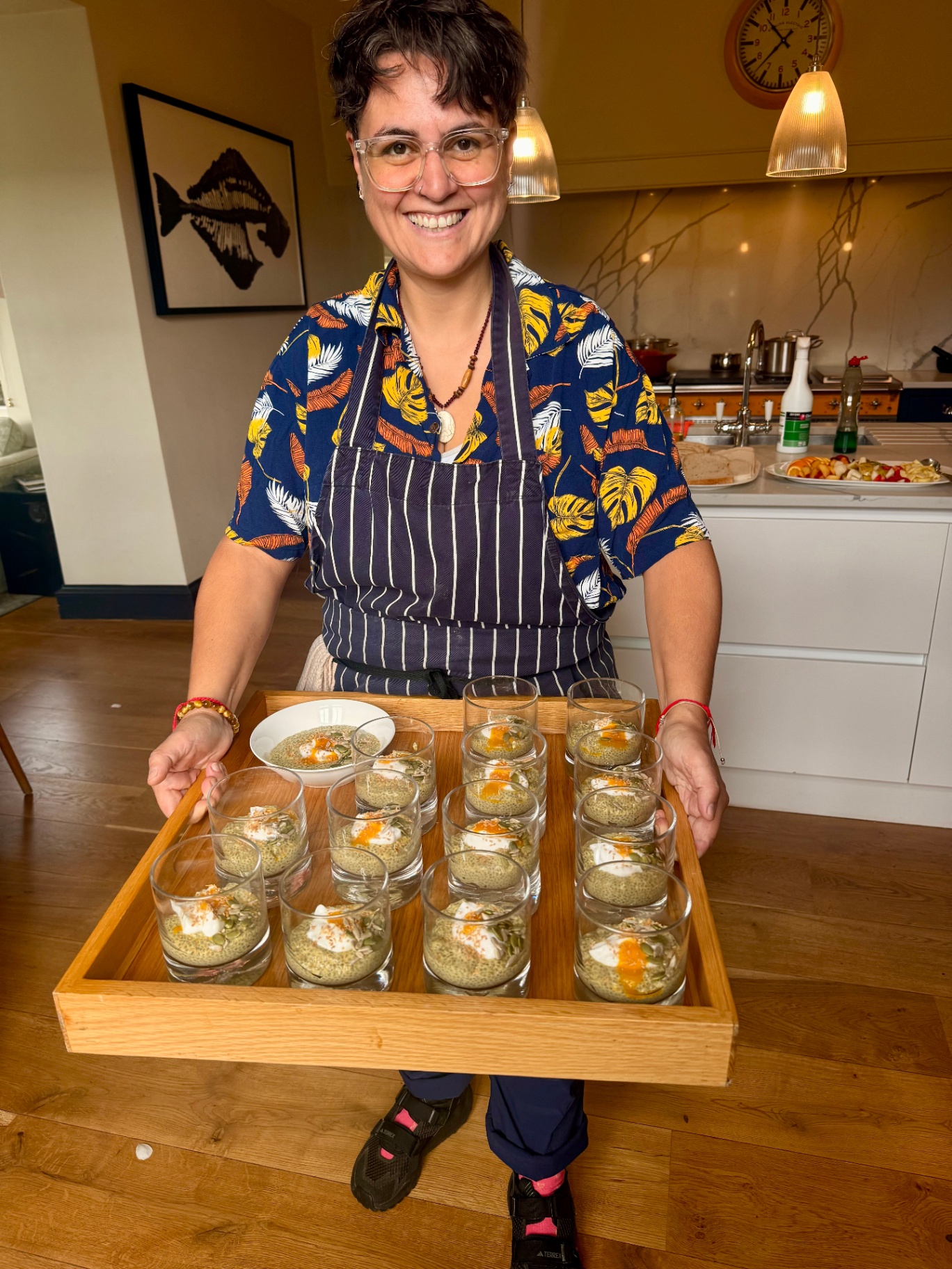 Dani presenting a tray of nourishing breakfasts