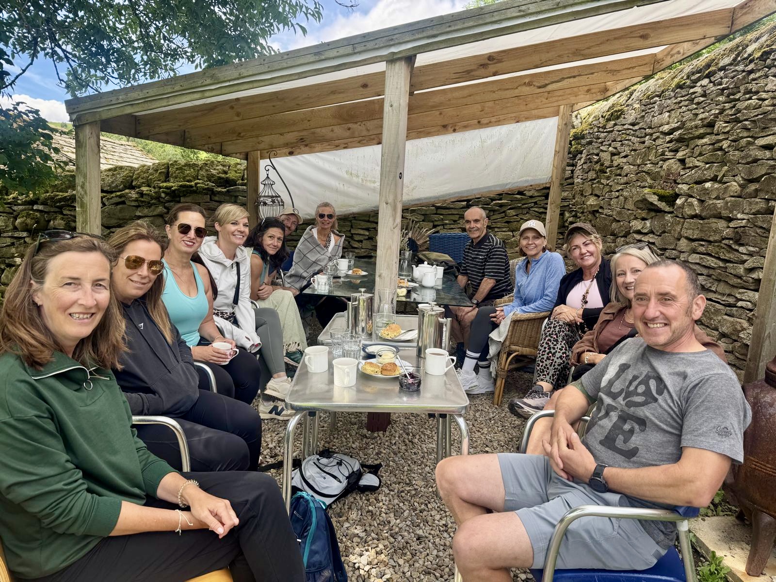 The group gathered for tea and scones after a hike